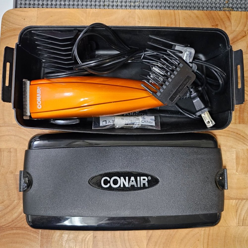 Conair corded trimmer with hard shell case and three attachments